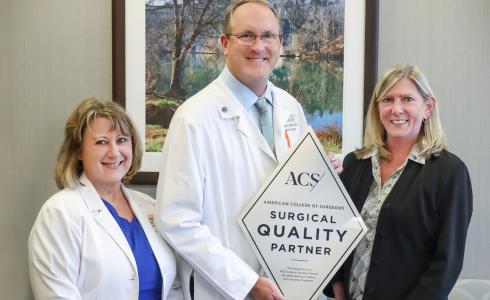 University Bariatric Center team members pose with Surgical Quality Partner sign