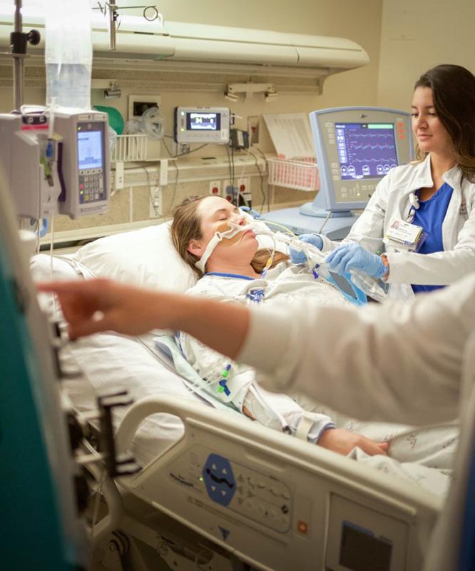 Team members work in the Medical Critical Care unit
